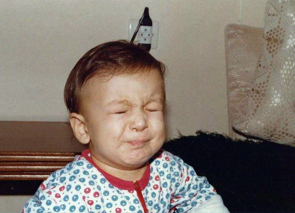 Paul tasting something he disapproves.